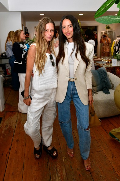 DJ Pamela Tick and influencer Arielle Charnas posing in a store