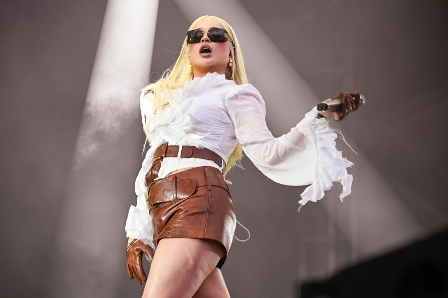 Kim Petras wears Miu Miu sunglasses and Paris Texas boots during her performance at Governors Ball 2023.